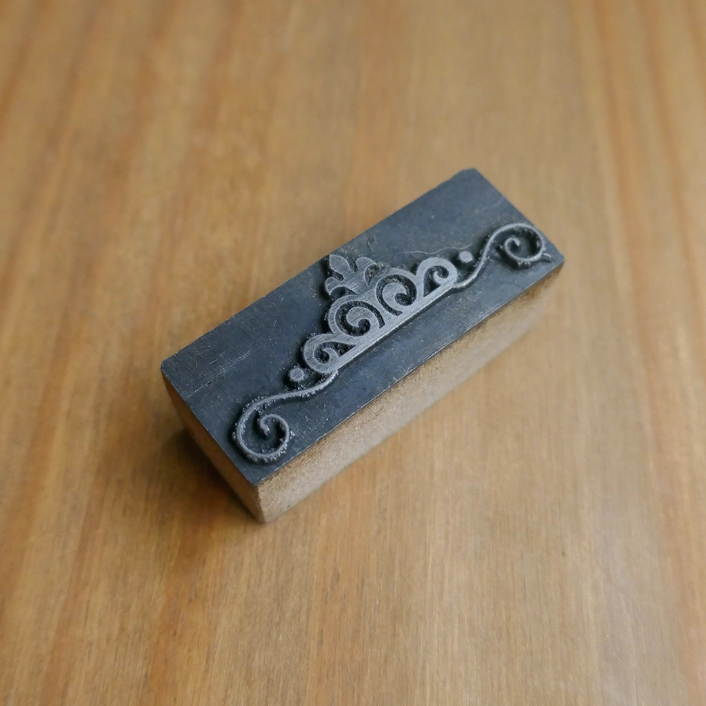 Fleur-de-lis Scrollwork Flourish